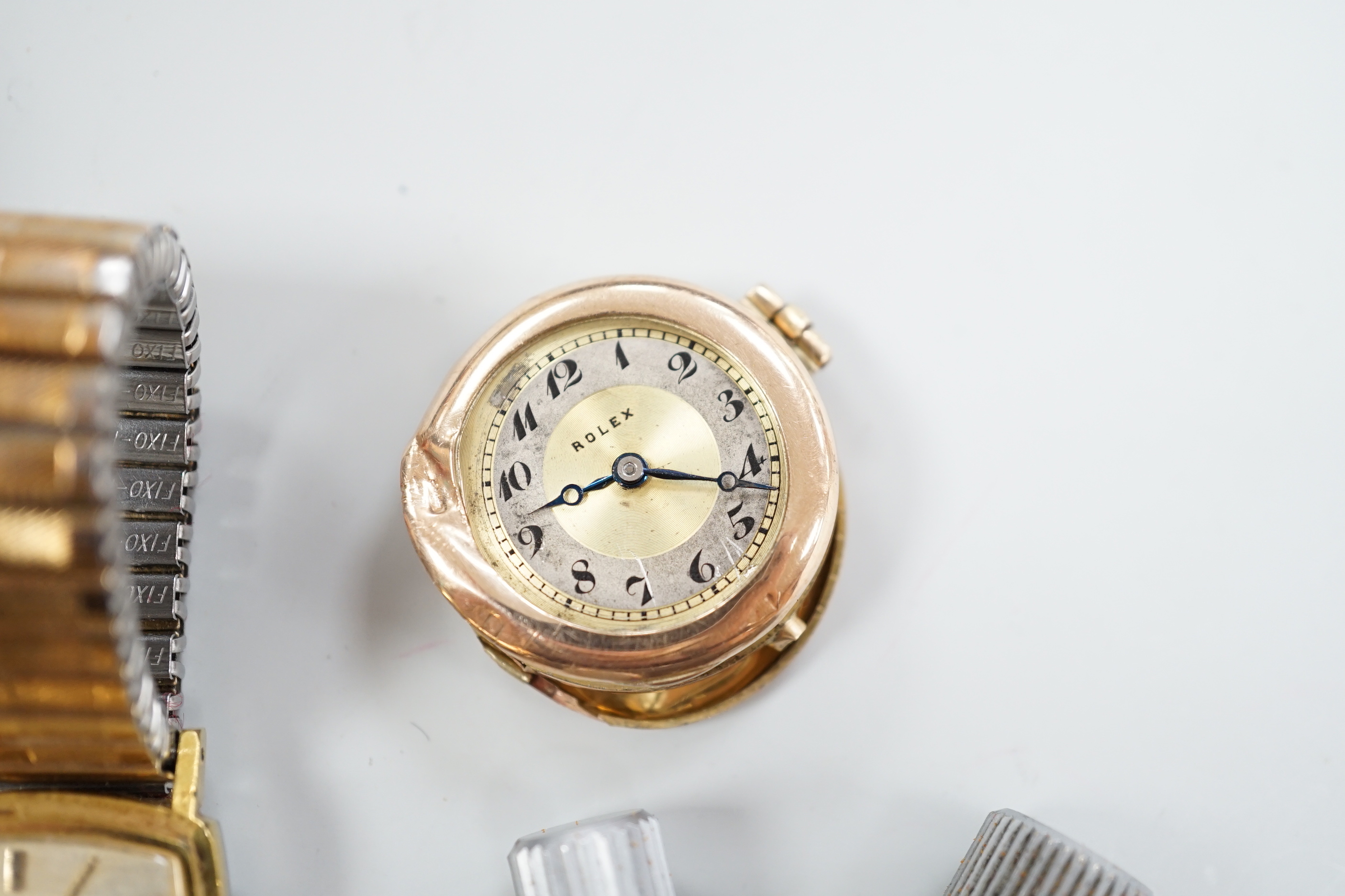 A lady's 9ct Rolex watch (a.f.), a stainless steel Enicar military watch, a gentleman's stainless steel Omega manual wind wrist watch, cased diameter 35mm, five other watches or movements and an Omega stop watch.